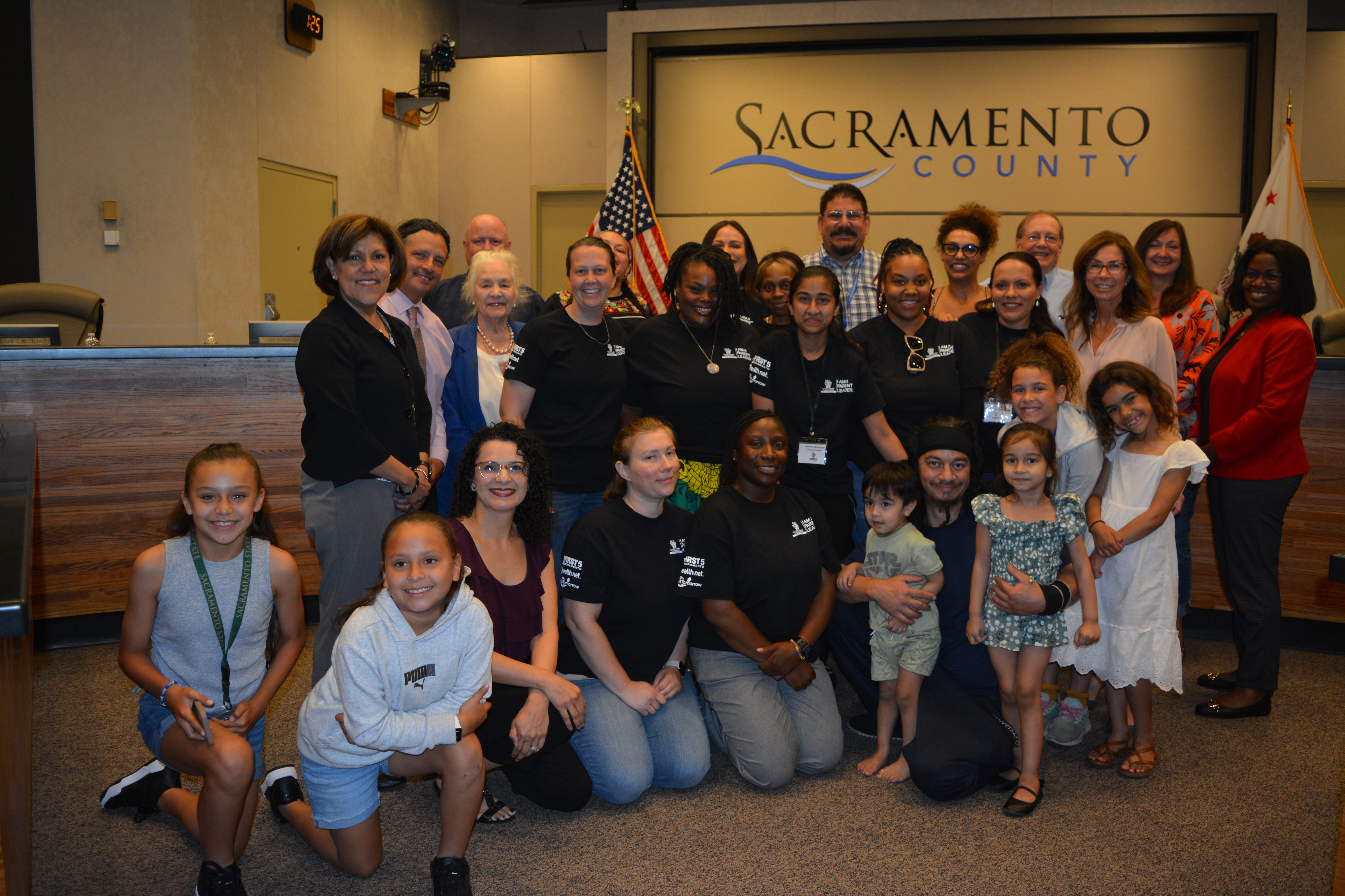 First 5 Sacramento Staff and Commissioners with PLTI parents at Commission meeting on June 5, 2023.